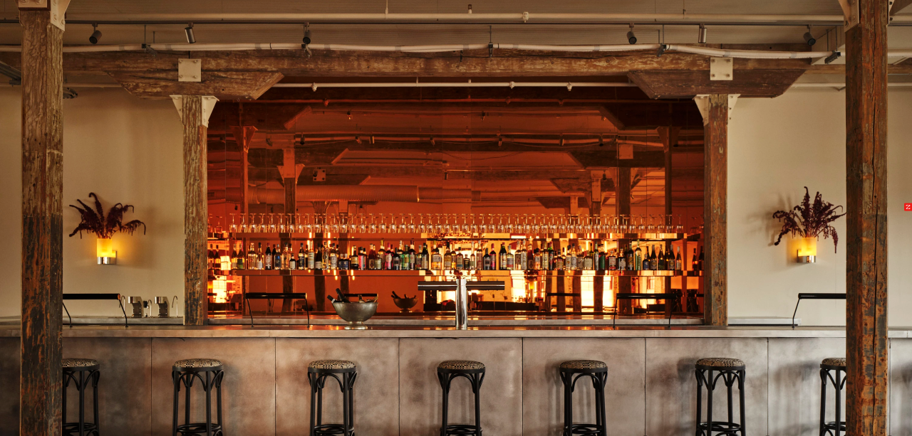 Pocketbook Factory Historic Conversion Adaptive Reuse Construction Project by ARCO/Murray - Photo of the Bar