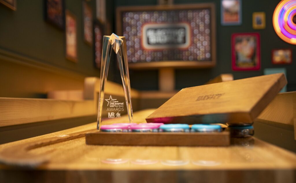 Illinois RE Journal Award on Electric Shuffle's Shuffleboard Table
