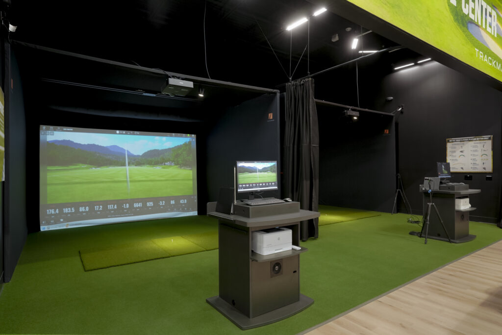 Indoor golf simulator bays at DICK’S House of Sport in Thornton, Colorado